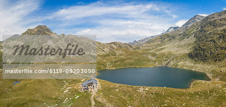 Aerial panoramic of Lake Emet, Rifugio Bertacchi and peak Emet, Spluga Valley, Sondrio province, Valtellina, Lombardy, Italy, Europe Aerial panoramic of Lake Emet, Rifugio Bertacchi and peak Emet, Spluga Valley, Sondrio province, Valtellina, Lombardy, Italy, Europe