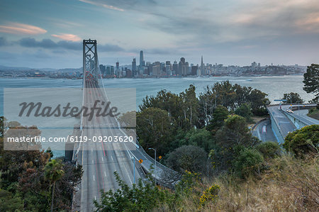 View of San Francisco skyline and Oakland Bay Bridge from Treasure Island at dusk, San Francisco, California, United States of America, North America