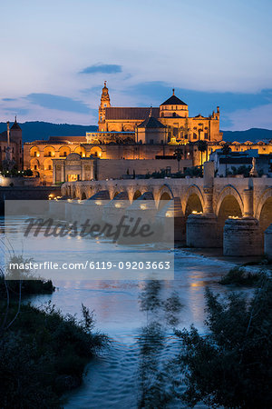 The Cathedral and Great Mosque of Cordoba (Mezquita) and Roman Bridge at twilight, UNESCO World Heritage Site, Cordoba, Andalucia, Spain, Europe