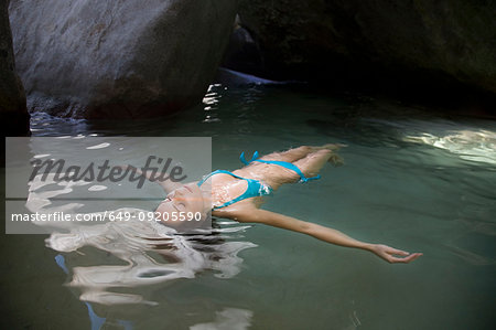 Woman Floating in Cave