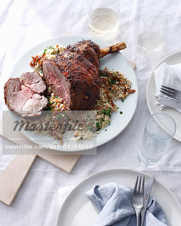 Plate of roast lamb and couscous