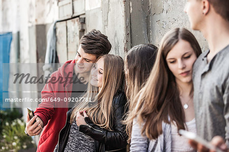 Teenagers hanging out at abandoned building
