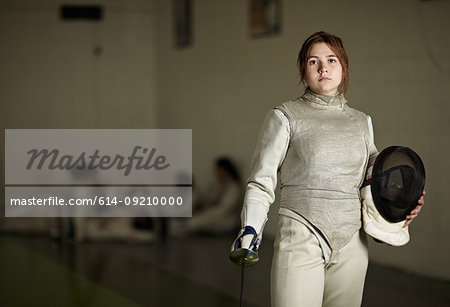 Portrait of teenage female fencer