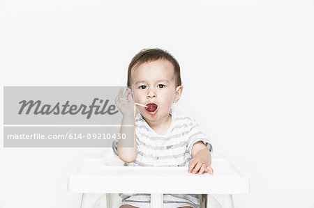 Baby boy with lollipop