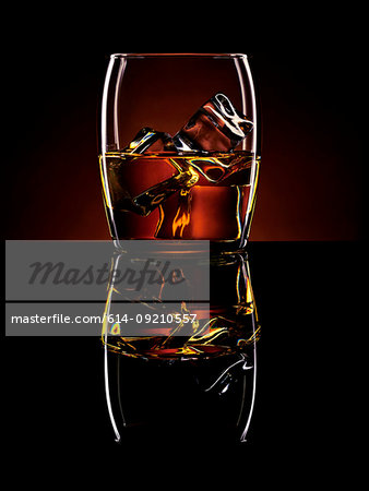 Still life of alcoholic drink with ice cubes Still life of alcoholic drink with ice cubes