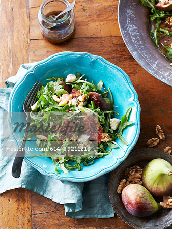 Still life of salad with walnuts, figs and gorgonzola