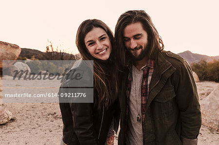 Portrait of young couple in desert, Los Angeles, California, USA