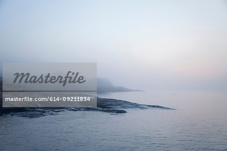 View of coastline and mist over sea, Gloucester, Massachusetts, USA