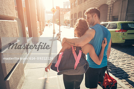 Young couple returning from training