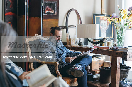 Couple reading in room