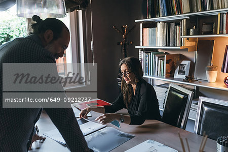 Couple working in home office