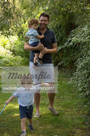 Father and children in park