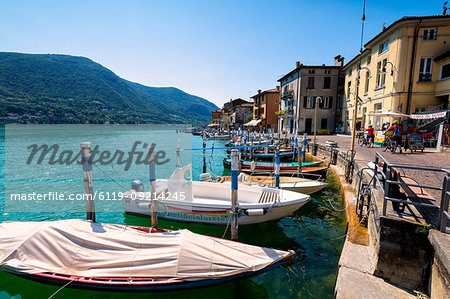 Boats moored at Monte Isola, the largest lake island in Europe, Province of Brescia, Lombardy, Italy, Europe