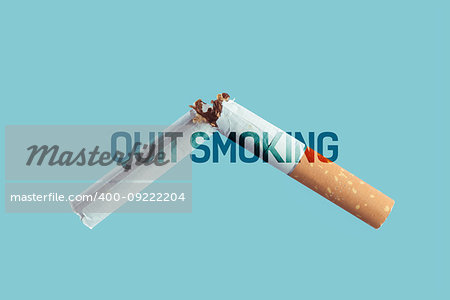 Cigarette burning on light blue background, smoke addiction and quitting concept
