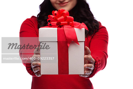 Christmas Santa hat isolated woman portrait hold christmas gift. Smiling happy girl on white background.