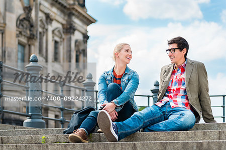 tourists, woman and man, enjoying the view from bridge at the Museum Island in Berlin