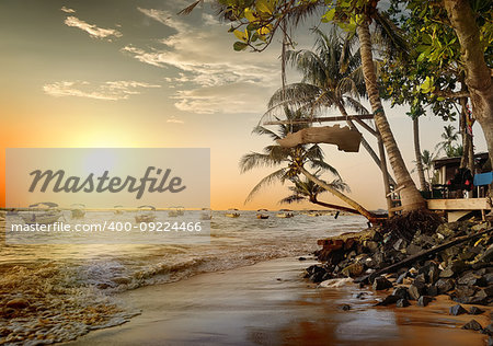 Coastline in Sri Lanka and small boats in the ocean