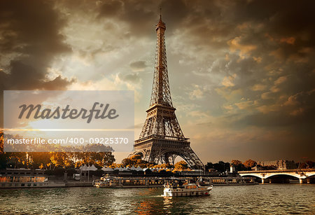 Eiffel Tower and bridge Iena on the river Seine in Paris, France.