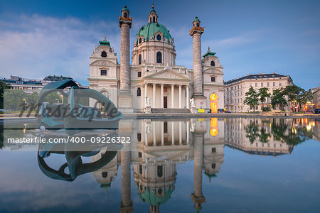 Image of St. Charles's Church in Vienna, Austria during twilight blue hour.