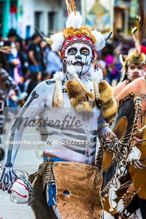 Indigenous tribal dancer at a St Michael Archangel Festival parade in San Miguel de Allende, Mexico