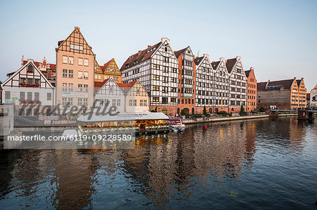 Hanseatic League houses on the Motlawa River at sunset, Gdansk, Poland, Europe