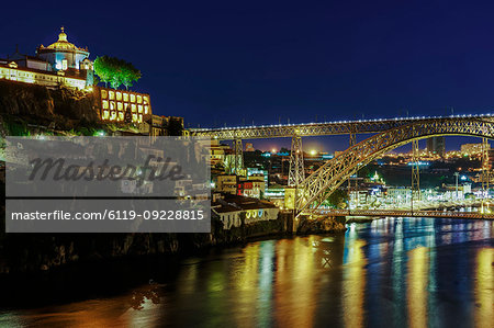 View of Monastery of Saint Augustine of Serra do Pilar and Dom Luis Bridge over the Douro River at night, Porto, Portugal, Europe