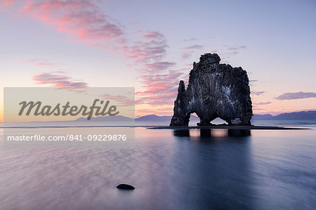 Hvtserkur, a dragon shaped rock in North West Iceland at sunset, around midnight in summer, Iceland, Polar Regions