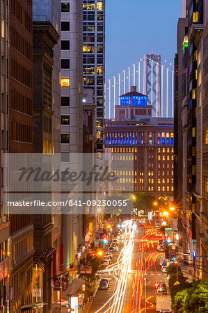 View of California Street and Oakland Bay Bridge at dusk, San Francisco, California, United States of America, North America