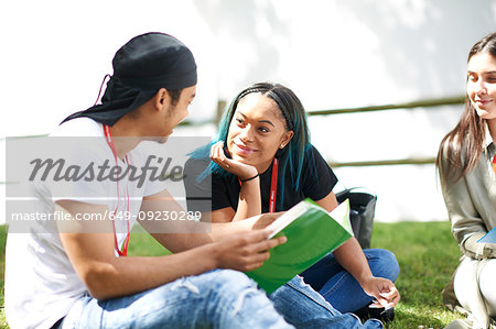 College students reading and talking in campus