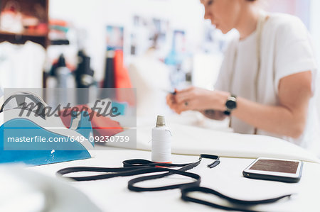Fashion designer working in her studio