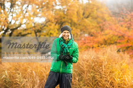 Mature woman exercising in park