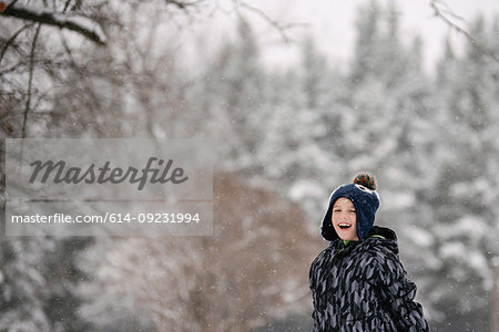Boy in winter landscape