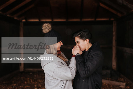 Happy couple enjoying romance and hugs