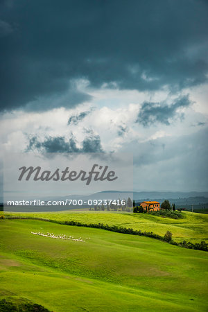 Stormy sky over farming country in Tuscany, Italy.