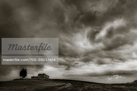 Rain storm approaching farm in Tuscany, Italy.