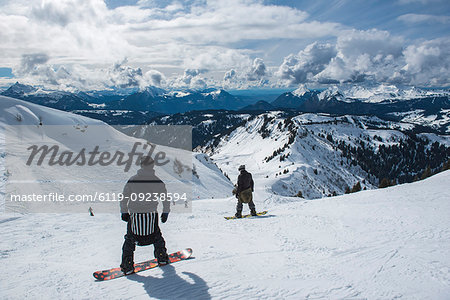 Snowboarders in the Morzine Ski Area, Port du Soleil, Auvergne Rhone Alpes, French Alps, France, Europe