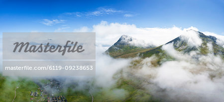 Aerial panoramic of clouds above Gjogv, Eysturoy island, Faroe Islands, Denmark, Europe