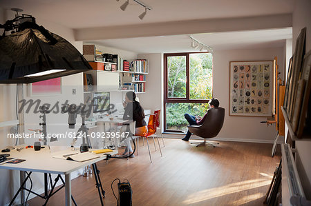 Couple working and reading in home office