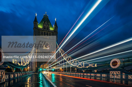 Blurred lights on Tower Bridge at night, London, UK