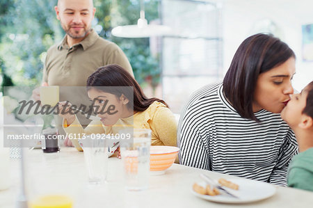 Affectionate family enjoying breakfast