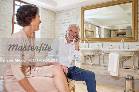 Mature couple in hotel bathroom