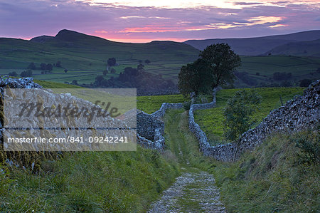 Sunset over Goat Scar Lane, Stainforth, North Yorkshire, England, United Kingdom, Europe Sunset over Goat Scar Lane, Stainforth, North Yorkshire, England, United Kingdom, Europe