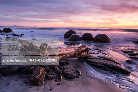 The Moeraki Boulders at sunrise, Moeraki Beach, Otago, South Island, New Zealand, Pacific The Moeraki Boulders at sunrise, Moeraki Beach, Otago, South Island, New Zealand, Pacific