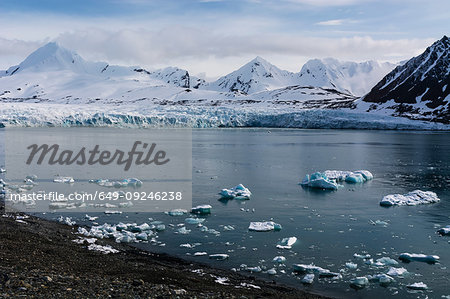 Coastal landscape with sea ice and snow covered mountains, Isbjornhamna, Hornsund bay, Spitsbergen, Svalbard, Norway
