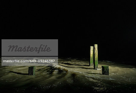 Big waves on Wadden Sea at night, Holwerd, Friesland, Netherlands