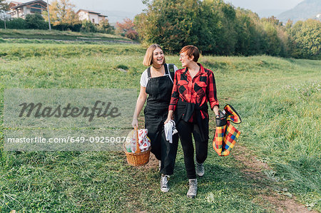 Friends going for picnic, Rezzago, Lombardy, Italy