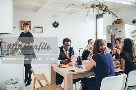 Businessmen and businesswomen on lunch break in loft office