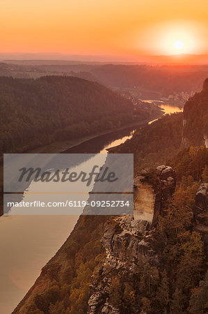 Elbe river at sunset in Elbe Sandstone Mountains, Germany, Europe