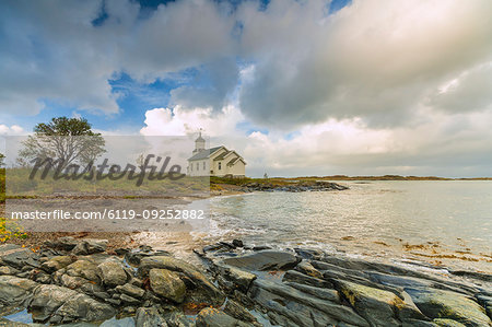 Church by beach on Gimsoya, Lofoten Islands, Norway, Europe