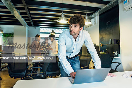 Businessman using laptop